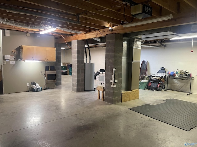 basement featuring heating unit and water heater