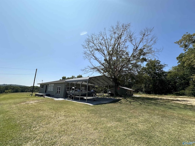 view of yard featuring a detached carport