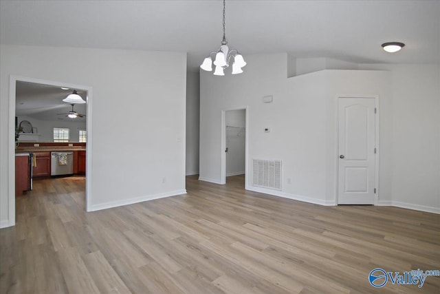 215 Shadow Ct SW, Huntsville, AL 35824 - unfurnished dining area featuring a chandelier, light wood finished floors, and ceiling fan