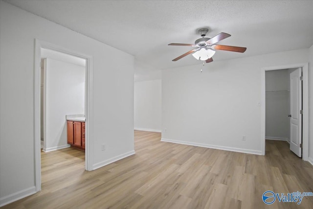 215 Shadow Ct SW, Huntsville, AL 35824 - empty room with ceiling fan and light wood-type flooring