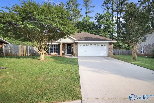 215 Shadow Ct SW, Huntsville, AL 35824 - ranch-style home with an attached garage, brick siding, and driveway