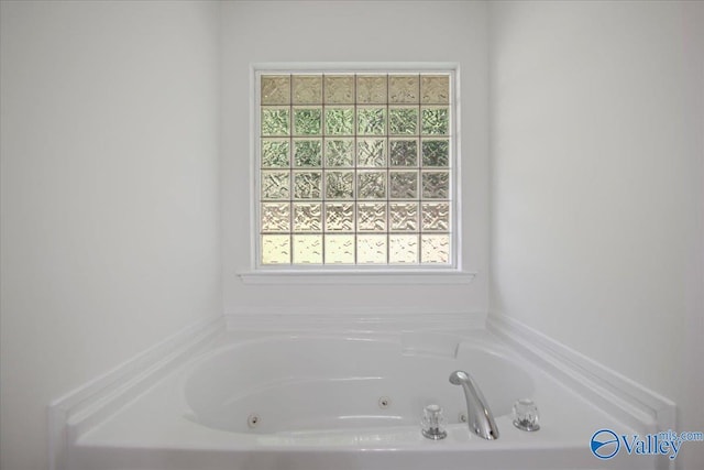 215 Shadow Ct SW, Huntsville, AL 35824 - bathroom with a whirlpool tub