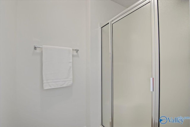 215 Shadow Ct SW, Huntsville, AL 35824 - bathroom with a shower stall
