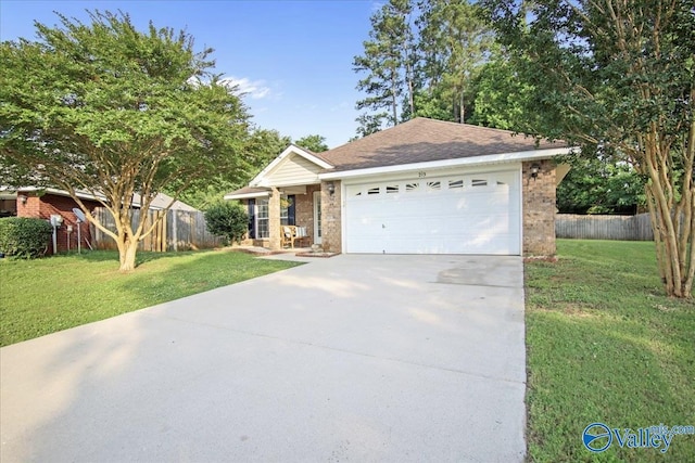 215 Shadow Ct SW, Huntsville, AL 35824 - single story home with brick siding, concrete driveway, and a garage