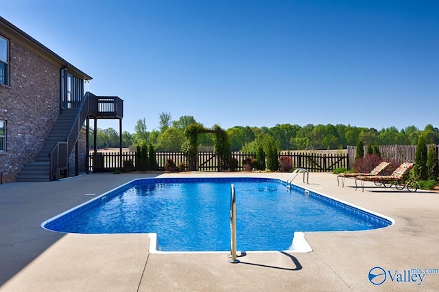 24188 Newby Rd, Madison, AL 35756 - view of pool featuring a fenced backyard, stairway, a patio, and a fenced in pool
