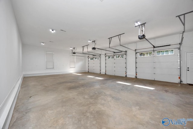 24188 Newby Rd, Madison, AL 35756 - garage featuring a garage door opener