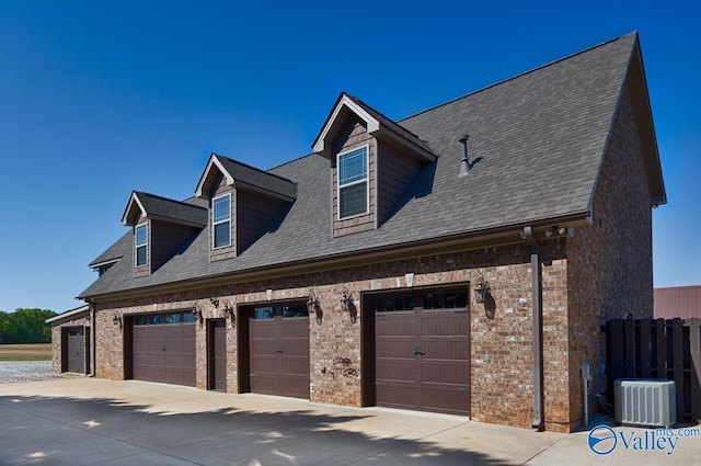 24188 Newby Rd, Madison, AL 35756 - view of side of home with brick siding, driveway, a shingled roof, and central AC unit