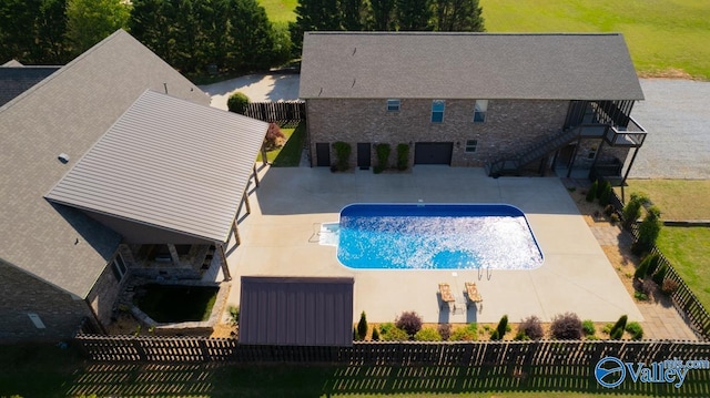 24188 Newby Rd, Madison, AL 35756 - view of swimming pool featuring a fenced in pool, a fenced backyard, a patio area, a lawn, and stairway