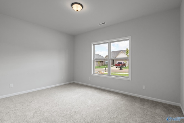 view of carpeted spare room