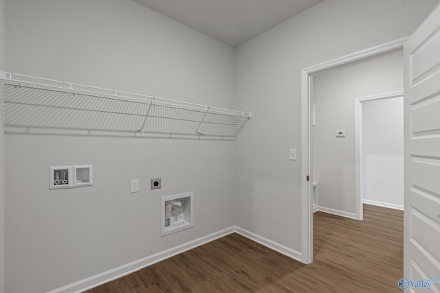 laundry area featuring electric dryer hookup, washer hookup, and dark hardwood / wood-style floors