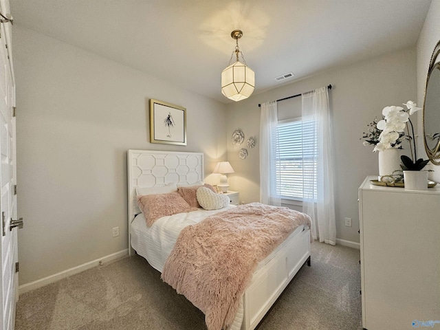 bedroom featuring carpet, baseboards, and visible vents