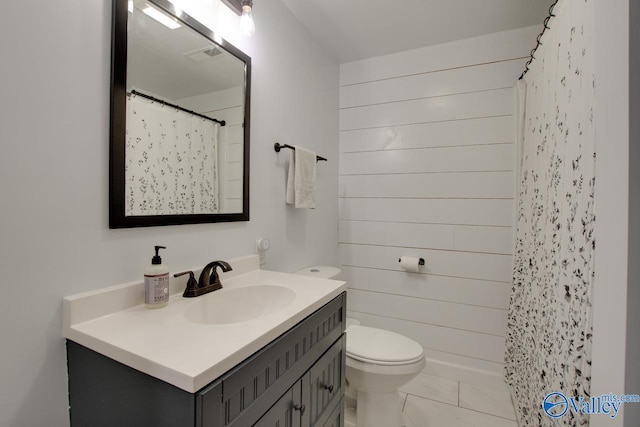 full bathroom with vanity, a shower with shower curtain, wooden walls, and toilet