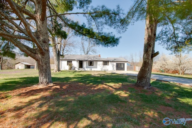 view of front of home with a front lawn