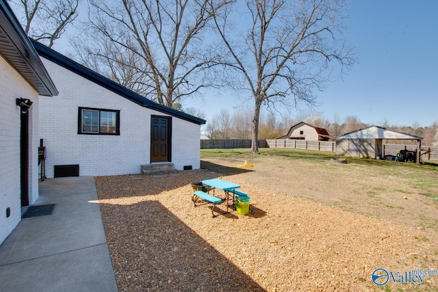 view of yard with fence