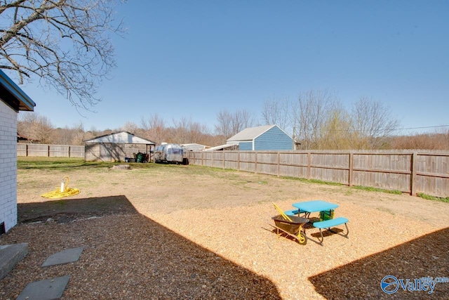 view of yard with a fenced backyard