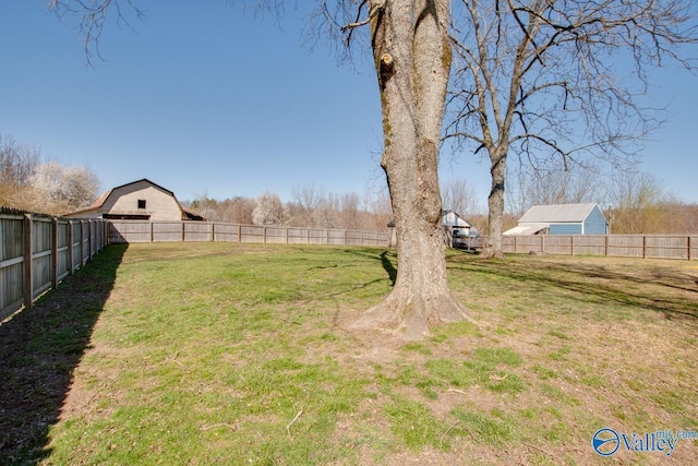 view of yard with a fenced backyard