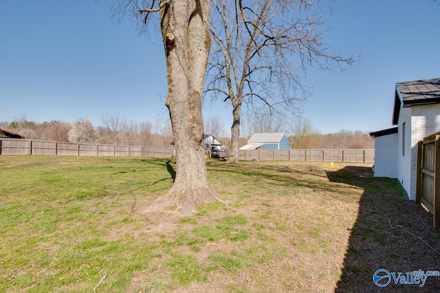 view of yard with fence