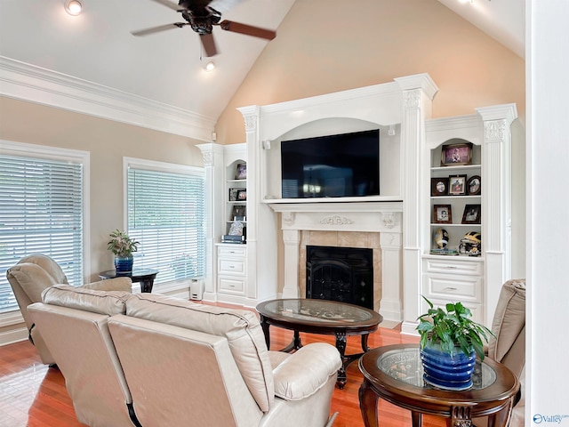 1103 Blackbriar Cir, Hartselle, AL 35640 - living room featuring a ceiling fan, wood finished floors, a tile fireplace, high vaulted ceiling, and recessed lighting