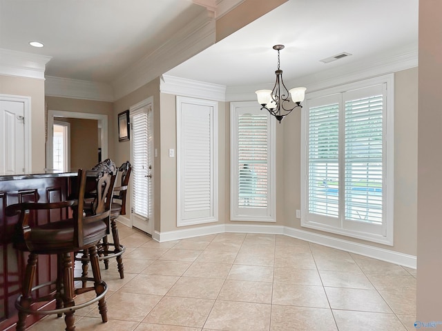 1103 Blackbriar Cir, Hartselle, AL 35640 - dining room featuring light tile patterned floors, crown molding, plenty of natural light, a chandelier, and baseboards