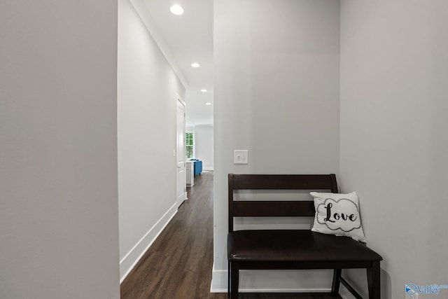 hall with dark hardwood / wood-style flooring