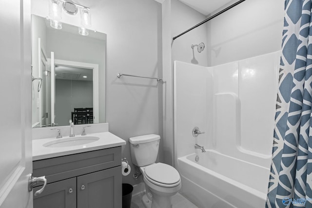 full bathroom with shower / bathtub combination with curtain, vanity, and toilet