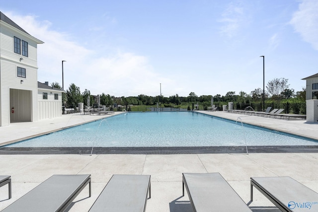 view of pool featuring a patio area