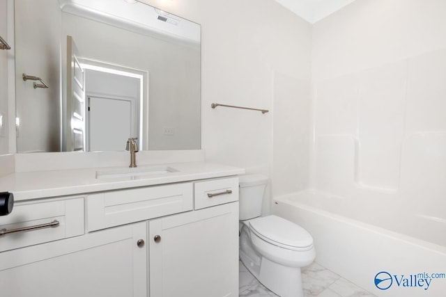 full bathroom with vanity, tub / shower combination, and toilet