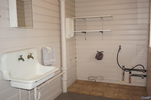 bathroom with wooden walls