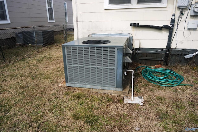 details with central AC and fence