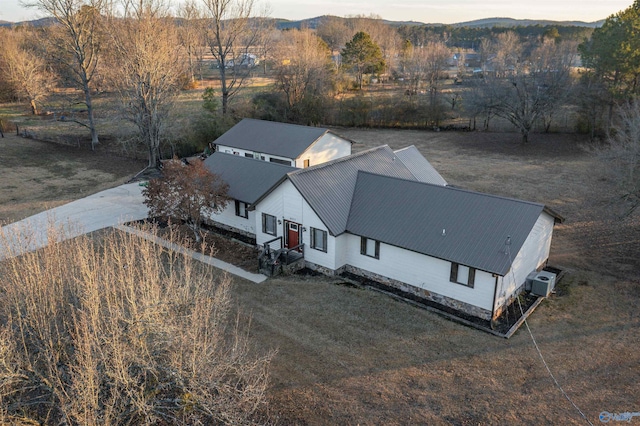 drone / aerial view featuring a mountain view