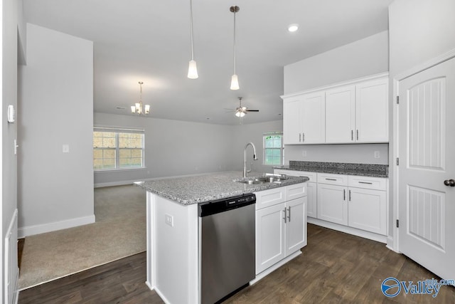 kitchen with dishwasher, ceiling fan with notable chandelier, white cabinetry, and an island with sink