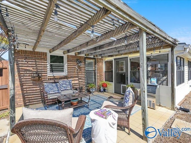 view of patio featuring an outdoor living space and a pergola