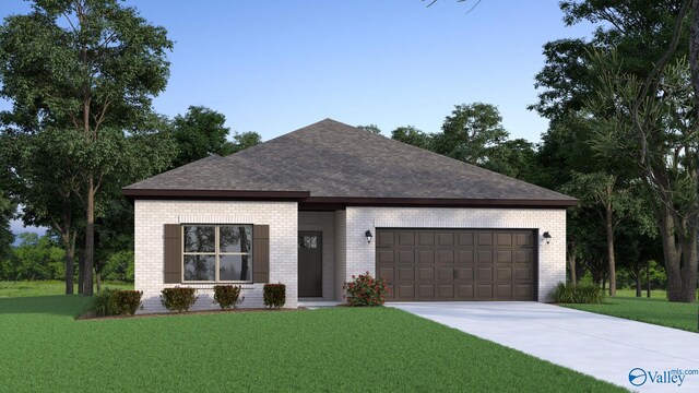 view of front of home featuring a garage and a front lawn