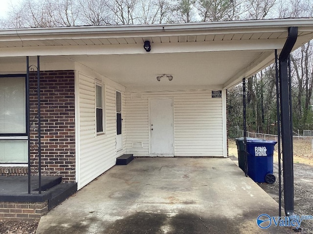 exterior space with a carport