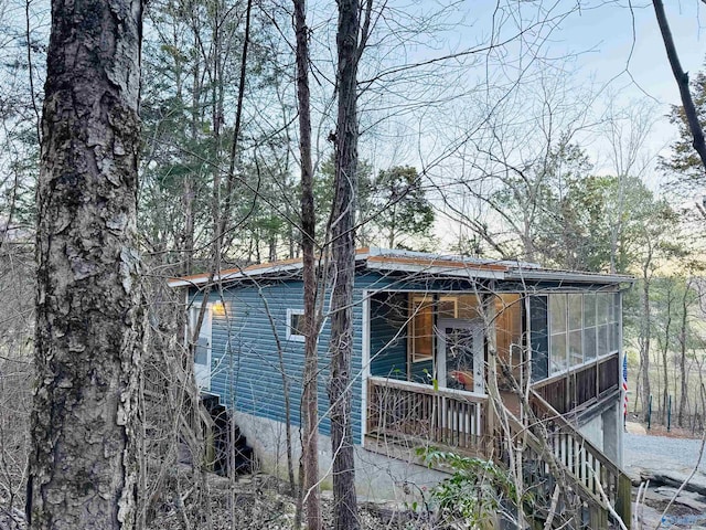 view of home's exterior with covered porch