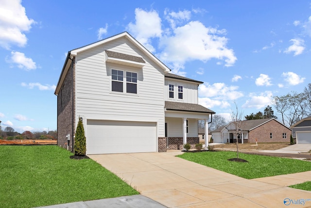 view of front of property with a porch, a front yard, and a garage