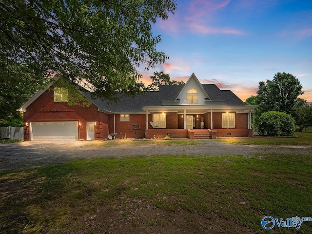 261 County Road 165, Pisgah, AL 35765 - view of front of home with a porch, dirt driveway, a yard, and brick siding