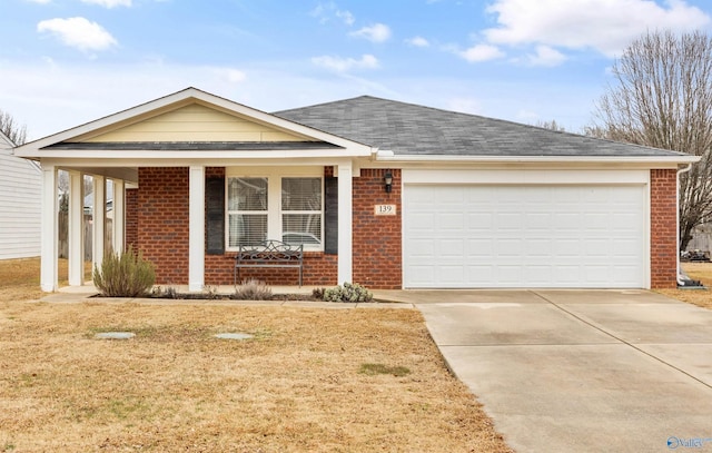 view of front facade with a garage, covered porch, and a front yard