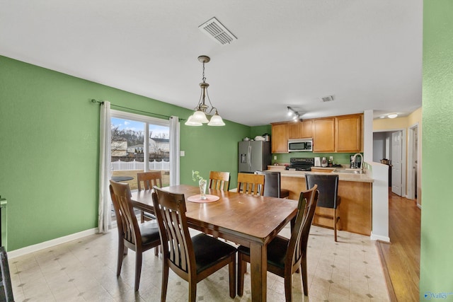 dining room featuring sink