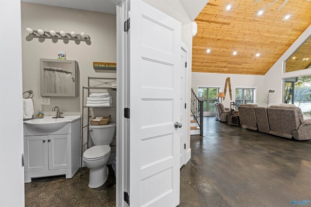 bathroom with high vaulted ceiling, vanity, wooden ceiling, concrete floors, and toilet