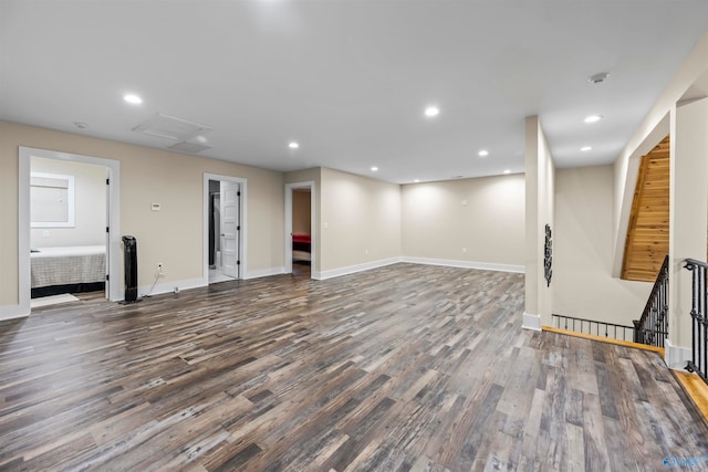 basement featuring dark hardwood / wood-style flooring