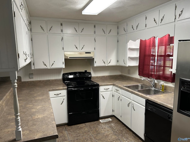 kitchen with sink, white cabinetry, and black appliances