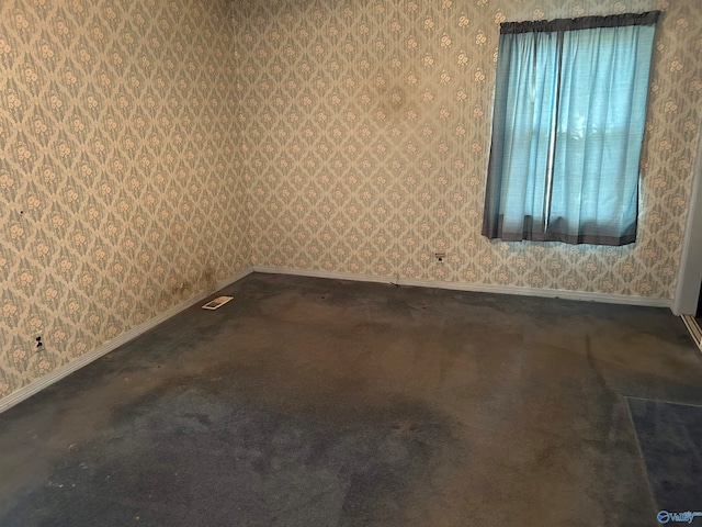 view of carpeted spare room