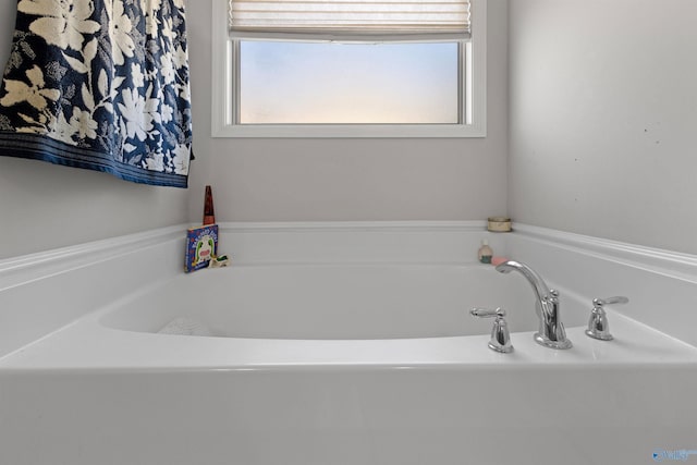 full bathroom with a bath