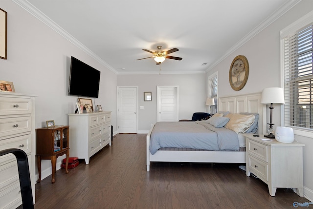 bedroom featuring crown molding, baseboards, a ceiling fan, and dark wood finished floors