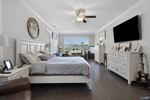 bedroom with dark wood-type flooring, ornamental molding, and a ceiling fan