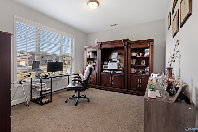 carpeted office featuring visible vents