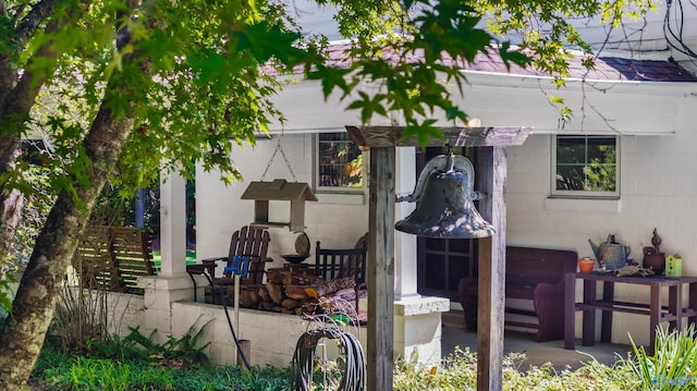 rear view of property featuring a patio area