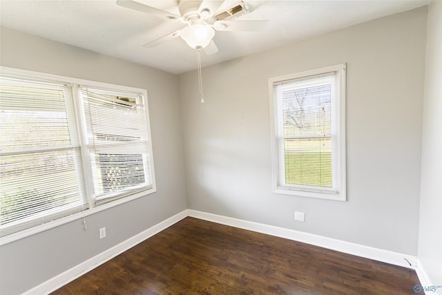 15766 Alabama Highway 79, Scottsboro, AL 35768 - spare room with baseboards, dark wood-type flooring, and ceiling fan