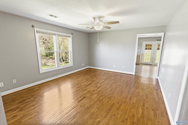 15766 Alabama Highway 79, Scottsboro, AL 35768 - unfurnished room featuring ceiling fan, wood finished floors, and baseboards